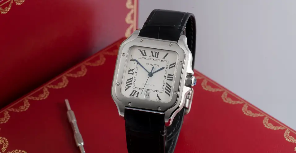vintage cartier santos watches featuring square case, visible screws, and leather strap